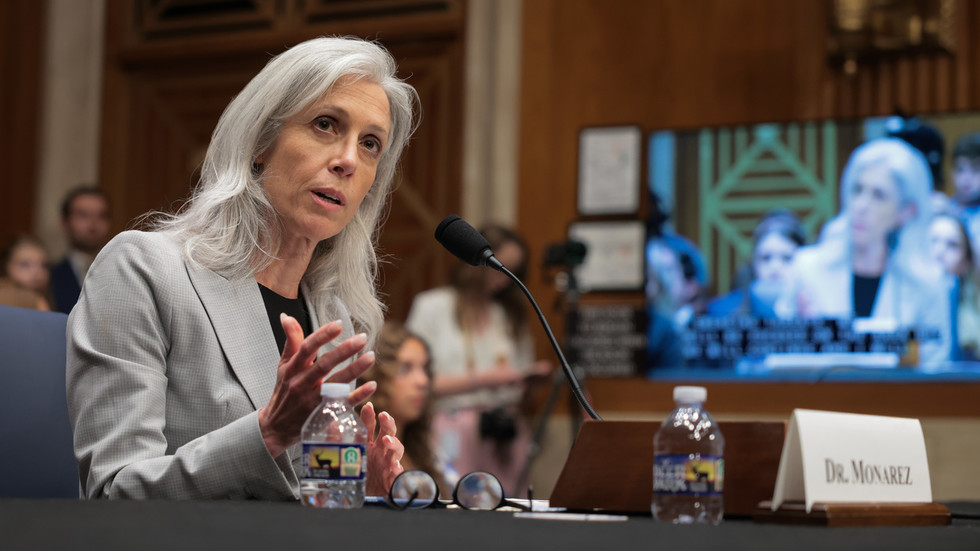 US disease control chief fired in clash over Covid vaccines
