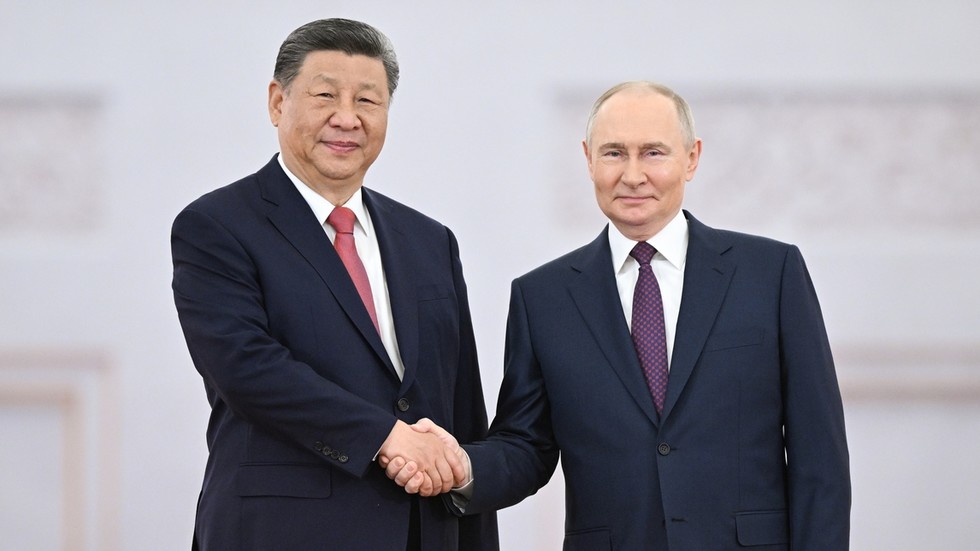 Putin hails Russia-China ties during call with Xi