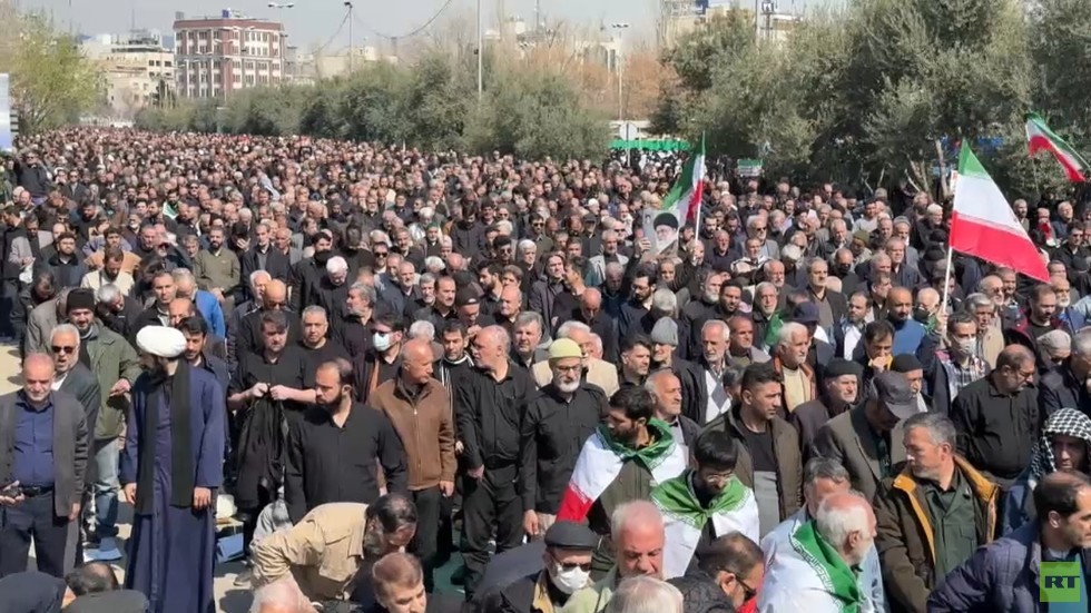 Iranians gather for first Friday prayers during war
