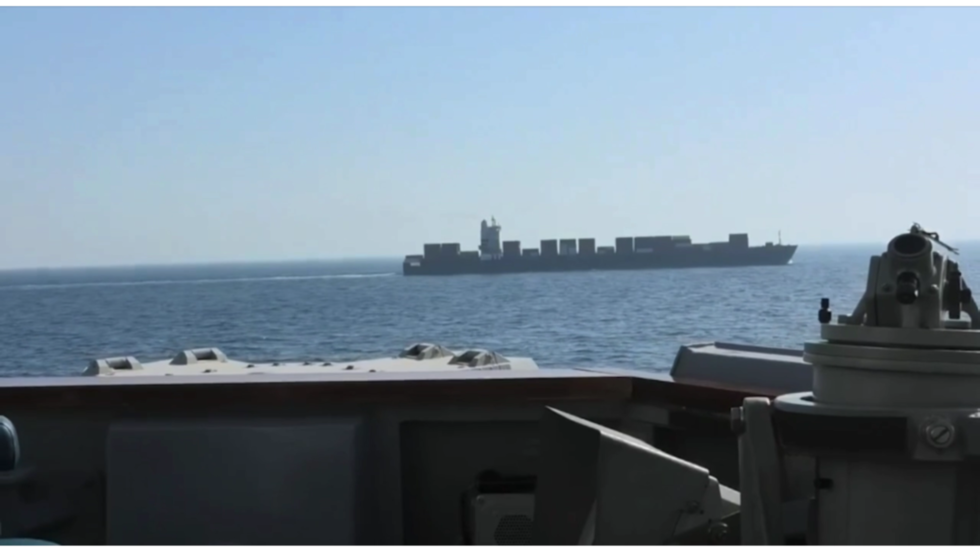 US destroyer fires on Iranian-flagged cargo ship (VIDEO)