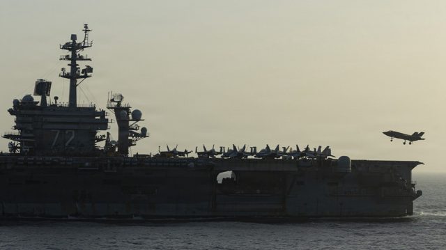 Troubled US aircraft carrier heads home after protracted deployment – media