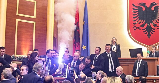 Albanian Lawmakers Light Flares, Hurl Water Bottles in Parliament Brawl