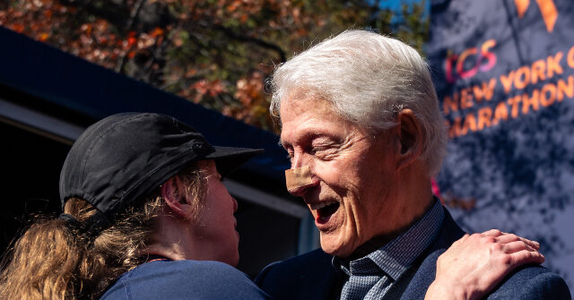 PHOTO: 79-Year-Old Bill Clinton Appears at NYC Marathon with Bandaged Nose
