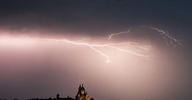 France Storm Kills Two, Rains Fell Inside Parliament as Prime Minister Addressed Chamber