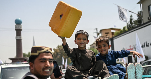 Taliban Puts Boys, Flowers Front and Center for 4th Anniversary of Afghanistan Conquest