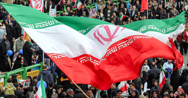‘Death to America’: Flag Burnings, Missiles, ‘Coffins’ for U.S. Generals at Iran’s Revolution Rally