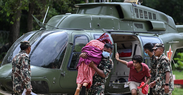 Watch: Nepal Rescue Workers Use Ziplines to Reach Flood Victims