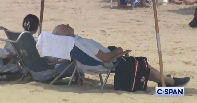 Biden Seen on Beach Struggling with Chair During First 4th of July Weekend Since Leaving Office