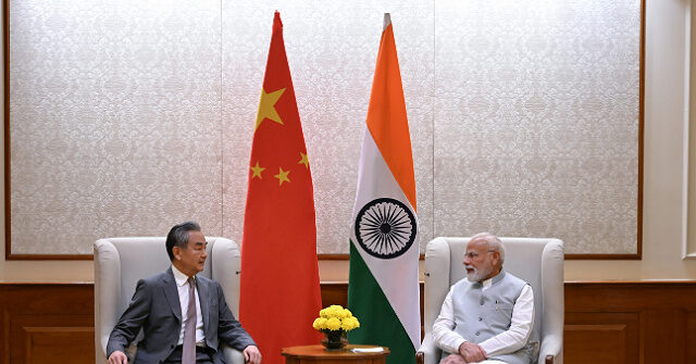 China Sends Foreign Minister to India, Seeking Ally Against Trump’s ‘Bullying’