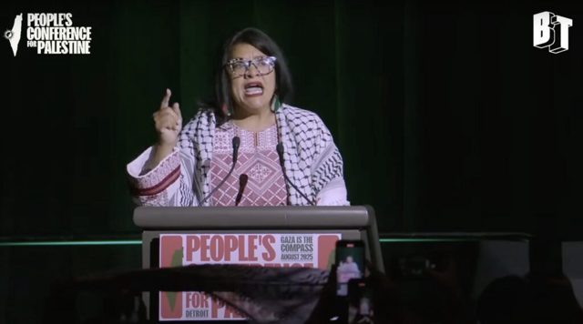 Radical Squad Member Rep. Rashida Tlaib Goes Full Anti-American at Pro-Hamas Rally — Boasts of Palestinian Infiltration and Curses in Vulgar Anti-Israel Tirade: “Every Genocide Enabler, Look at This Room, Motherf**kers… We are Not Going Anywhere” (VIDEO)
