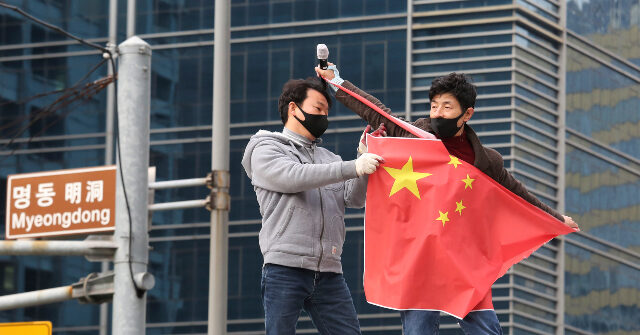South Korea Launches Police Probe Against Conservatives for Tearing Chinese Flag