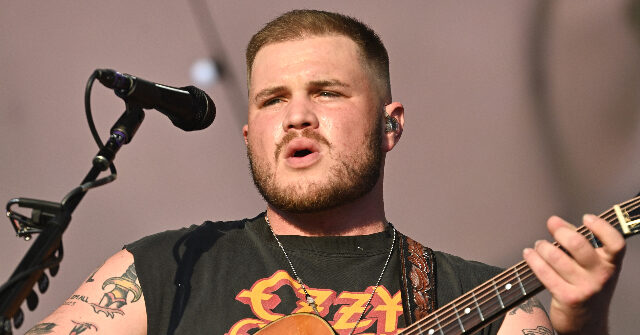 Country Singer Zach Bryan Releases Full Anti-ICE Song About ‘The Fading of the Red, White, and Blue’