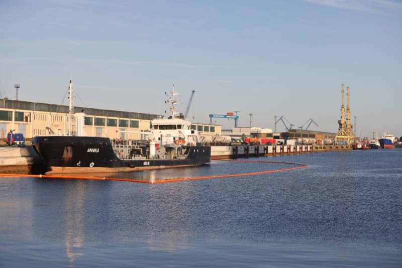 The tanker "Annika", which caught fire in the Baltic Sea off the coast of Mecklenburg-Western Pomerania, is moored in the Rostock seaport. The 73-metre-long "Annika" is said to have been carrying around 640 tons of oil at the time of the fire. Danny Gohlke/dpa