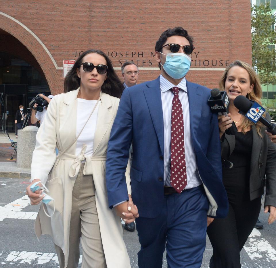 Former Fall River Mayor Jasiel Correia II,  exits John Joseph Moakley Federal Courthouse with his wife Jen Fernandes on Tuesday, Sept. 21, 2021. 