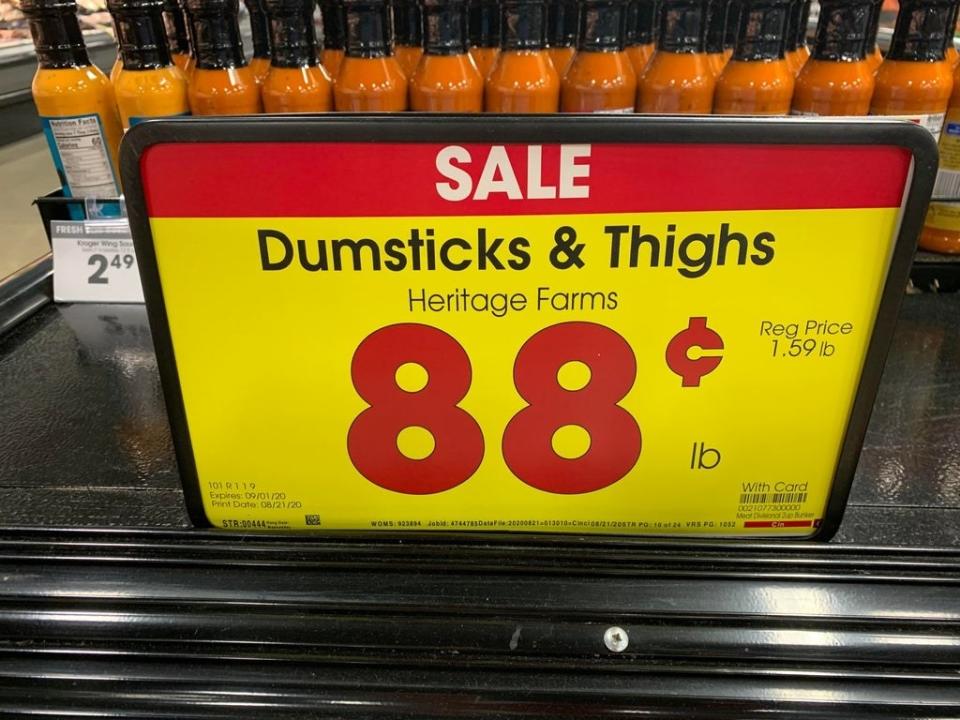 Sign reading "dumsticks & thighs"