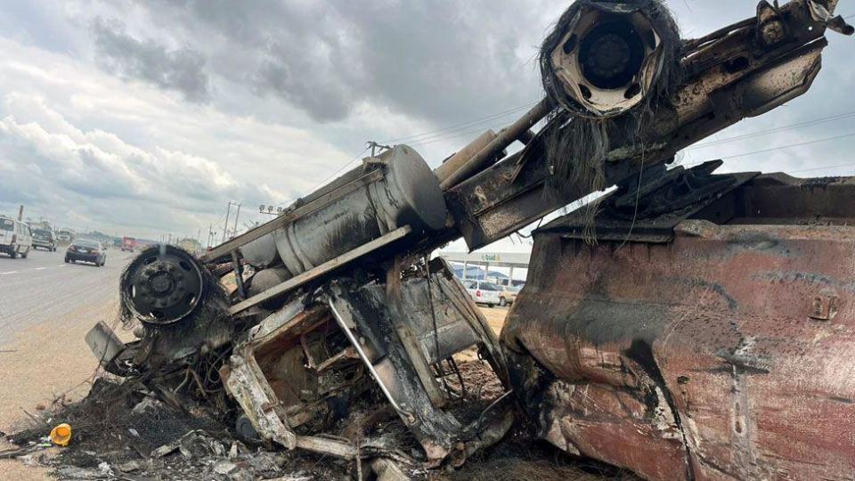 An overturned and burnt-out tanker along a main road in Ibafo, Ogun state, Nigeria - Wednesday 16 October 2024