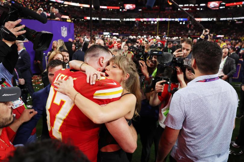 Travis Kelce #87 of the Kansas City Chiefs and Taylor Swift embrace after the Chiefs defeated the San Francisco 49ers  in overtime during Super Bowl LVIII at Allegiant Stadium on February 11, 2024 in Las Vegas. / Credit: Getty Images