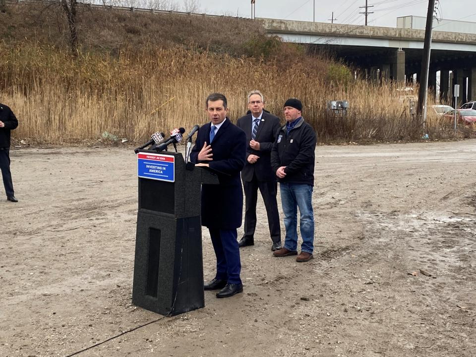 Transportation Secretary Pete Buttigieg spoke in Monroe in December about the River Raisin Bridge project.