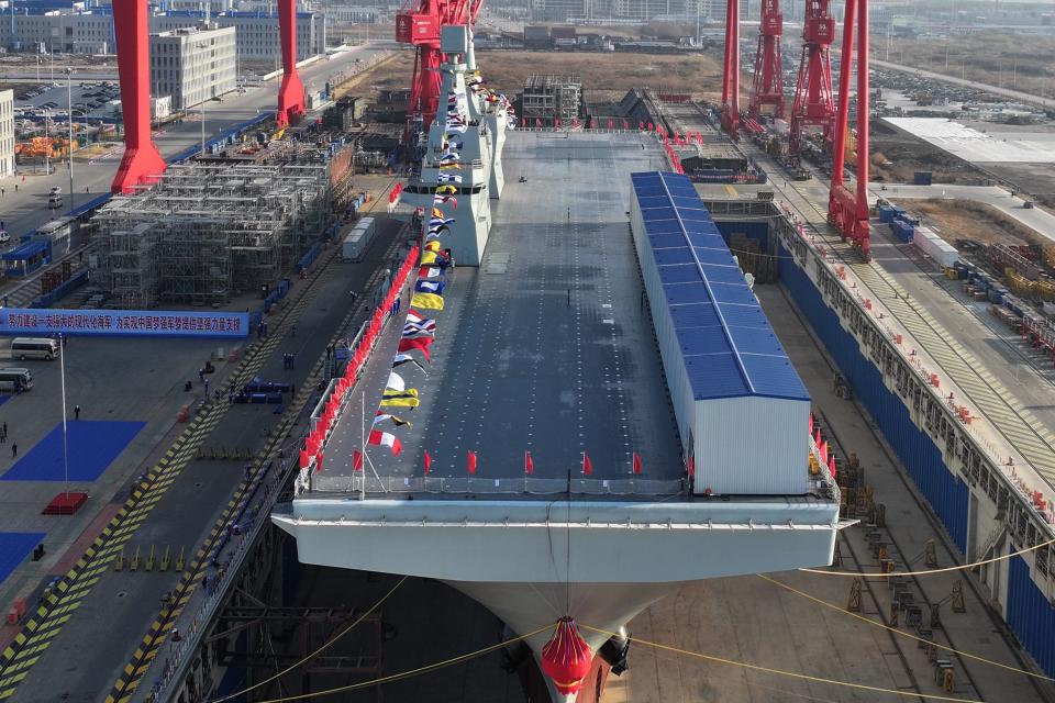 The wide flight deck of the Chinese amphibious assault ship, the Sichuan