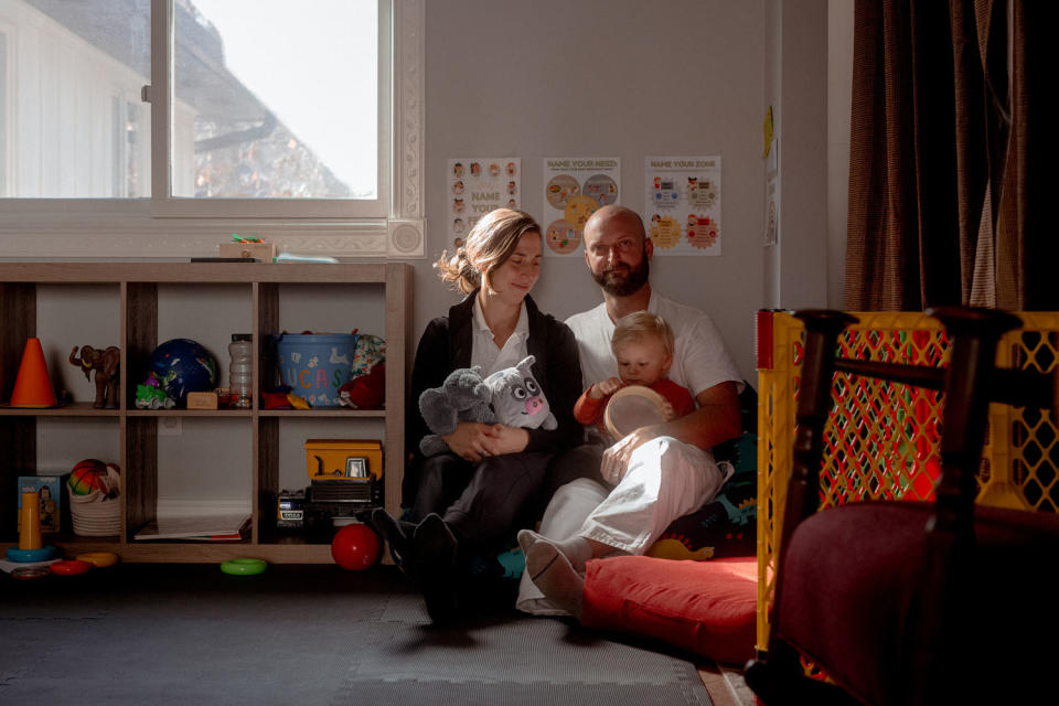 Andrew Sheffield and Rachel Kaplan with their son, Lucas, in their home in Arden, N.C.,  (Mike Belleme for NBC News)