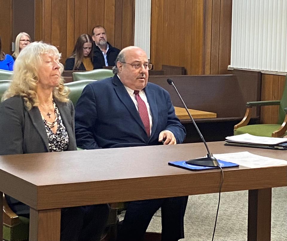 Marshella Chidester and her lawyer, Bill Colovos, sat before Judge Daniel White in Monroe County Circuit Court in December. Chidester's trial was set for March 3-7.