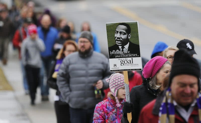 Participants march on 1300 East as Westminster celebrates Martin Luther King Jr. Day in Salt Lake City on Monday, Jan. 18, 2016. 