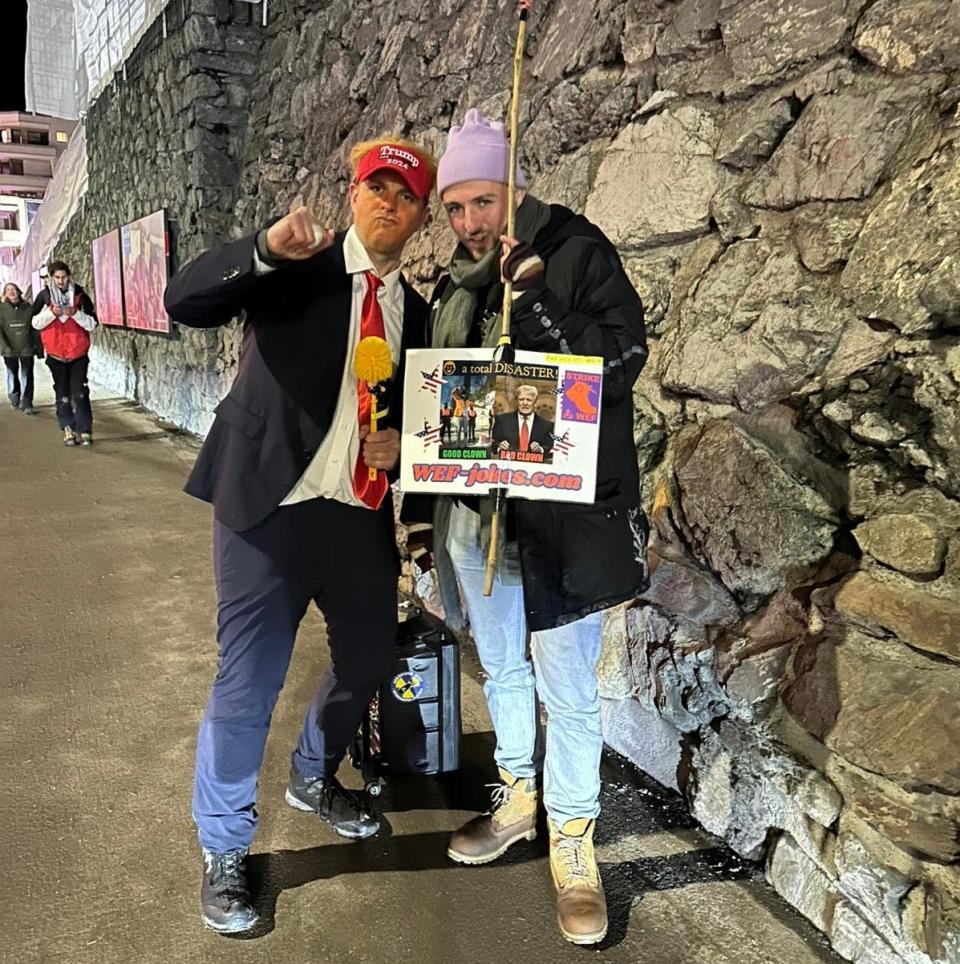 A protestor at Davos dressed as Donald Trump