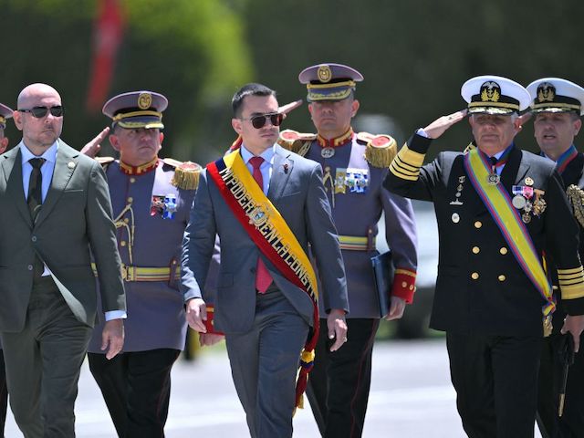 Ecuadorean President Daniel Noboa (C), accompanied by the Minister of Defense Gian Carlo Loffredo (2nd L), the Chief of the Joint Command of the Armed Forces, Jaime Vela (2nd R), and other members of the military high command, attends a military ceremony to commemorate the 215th anniversary of the First Cry of Independence at the Eloy Alfaro Military High School in Quito on August 8, 2024. (Photo by Rodrigo BUENDIA / AFP)