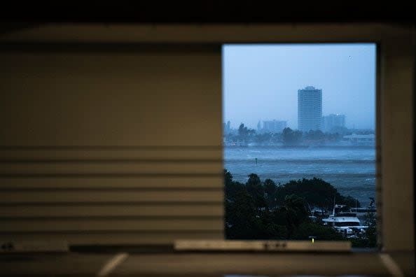 SARASOTA, FLORIDA - OCTOBER 9: Wind and rain batter the area as Hurricane Milton approaches on October 9, 2024 in Sarasota, Florida. Milton, which comes just after the recent catastrophic hurricane Helene, will hit Florida's central Gulf Coast and is expected to make landfall with destructive winds and flooding. (Photo by Sean Rayford/Getty Images)