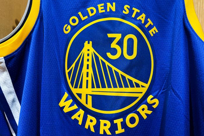 Golden State Warriors jersey with number 30 and bridge logo