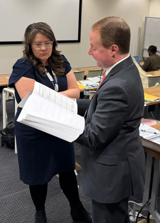 State Rep. Robert Stevens, R-Smyrna, consults with Tennessee Registry of Election Finance general counsel Lauren Topping Thursday, Jan. 23, 2025, about documents involving his complaint against Murfreesboro Mayor Shane McFarland, Smyrna Mayor Mary Esther Reed and a political action committee.