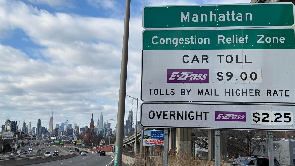 Start spreading the news: A congestion pricing car toll sign is seen on the westbound Long Island Expressway, in Queens, New York, Jan. 5, 2025. Cars entering Midtown and Lower Manhattan will now be charged a $9 toll.  / Credit: James Carbone/Newsday RM via Getty Images