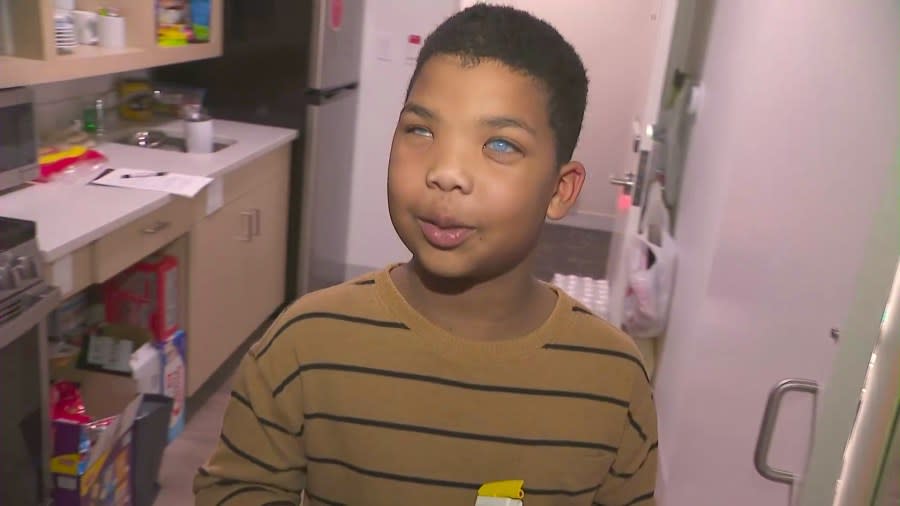 Grayson Roberts, 10, has a rare genetic eye condition that causes eventual blindness in his eyes. (KTLA)