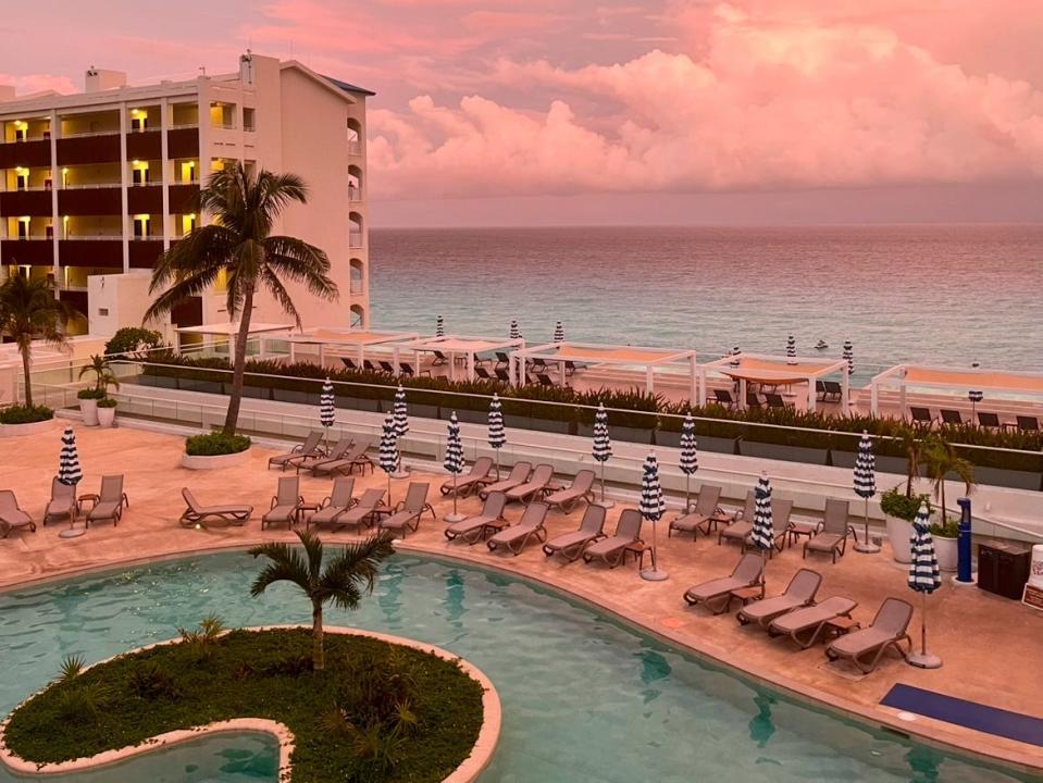 view of hilton cancun mar caribe resort at sunset