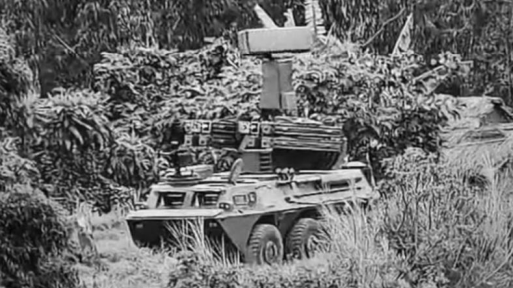 A black and white screenshot of a short-range air defence system - a weapon that resembles a tank.