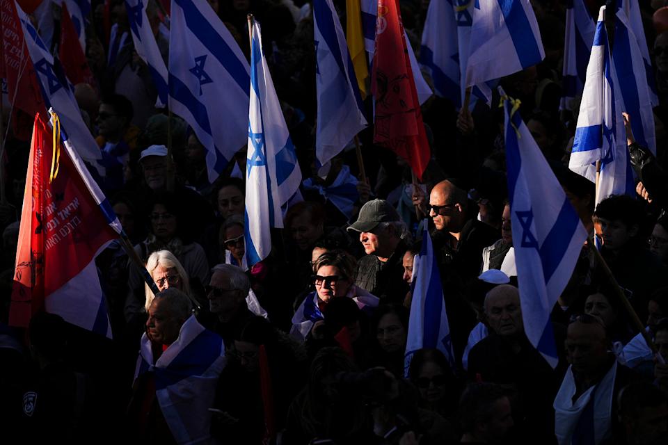 The mother and her two children were abducted by Hamas on Oct. 7, 2023, and their remains were returned from Gaza to Israel last week as part of a ceasefire agreement with Hamas. (Ariel Schalit / AP)