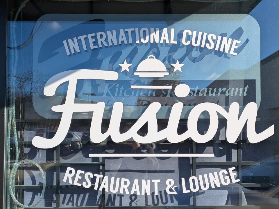 A photo of a sign outside of Fusion Kitchen, taken on Friday, February 14.