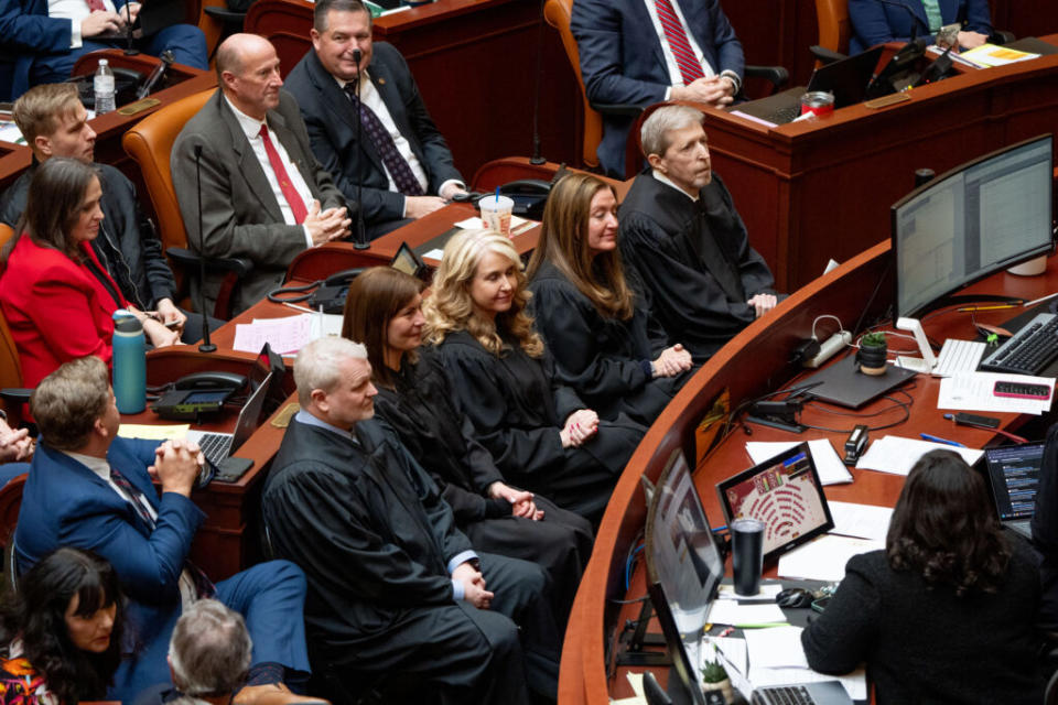  Utah Supreme Court justices John Pearce, Paige Petersen, Diana Hagen, Jill Pohlman, and Chief Justice Matthew Durrant, left to right, sit with legislators at the Capitol in Salt Lake City on the first day of the legislative session, Tuesday, Jan. 21, 2025. (Photo by Spenser Heaps for Utah News Dispatch)