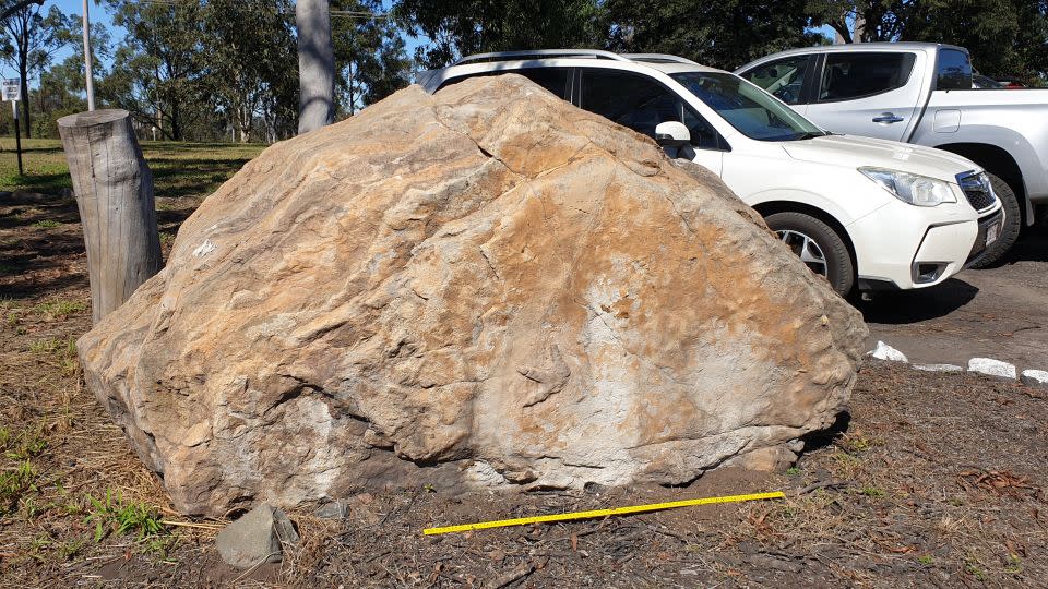 The researchers also analyzed a boulder being used as a parking lot entry marker at the Callide mine near Biloela. The rock has two distinct footprints left by a slightly larger dinosaur. - Courtesy The University of Queensland