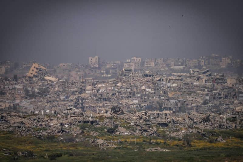 A general view of the destruction in Gaza seen from the border between Israel and Gaza. Israel launched a series of air strikes against the Palestinian Islamist group Hamas in the Gaza Strip on Tuesday after efforts to extend the ceasefire failed. Ilia Yefimovich/dpa