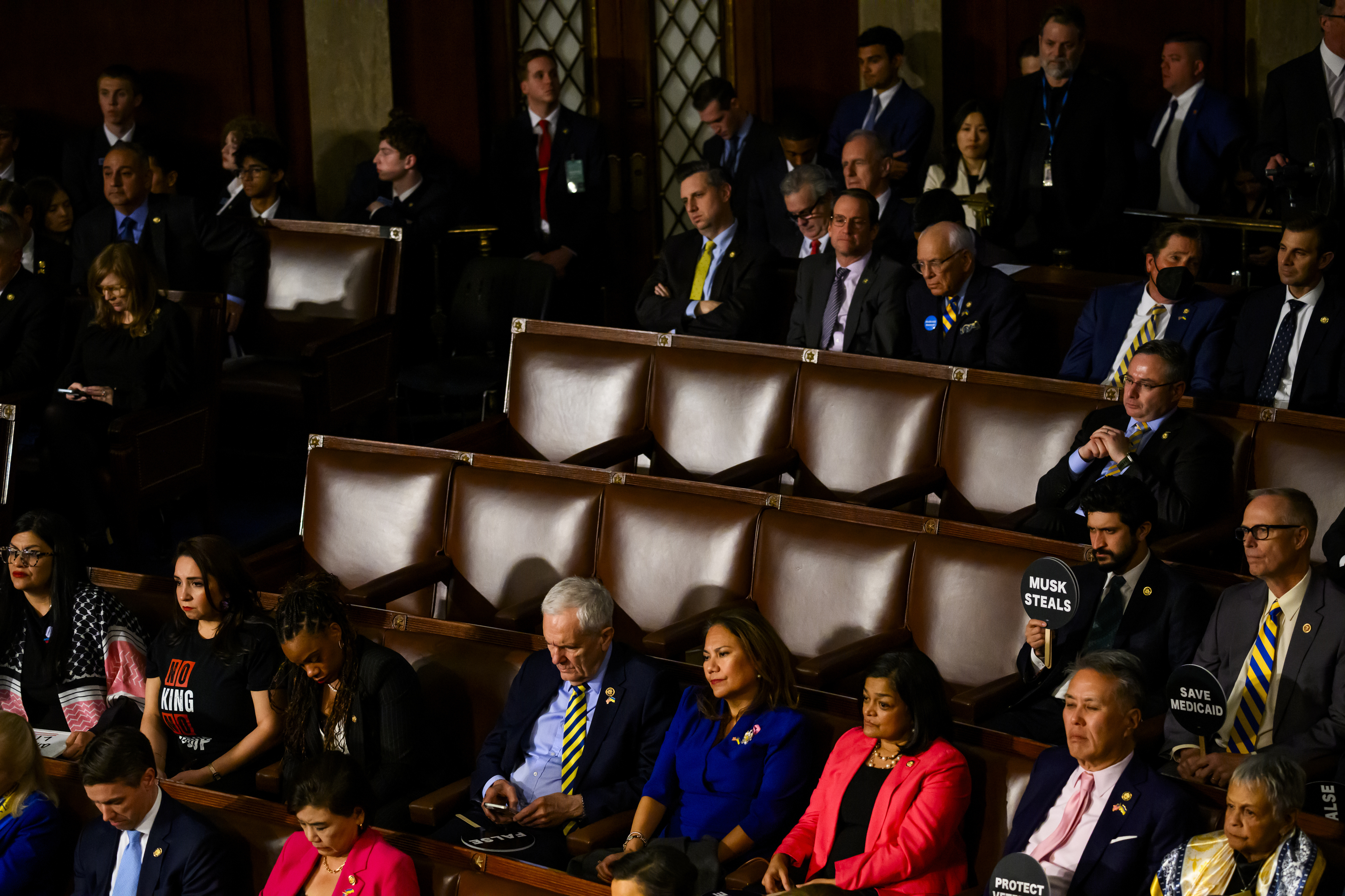 Empty seats are seen after Democratic lawmakers walked out in protest during President Donald Trump’s address to a joint session of Congress in the House chamber at the U.S. Capitol in Washington, on March 4, 2025.