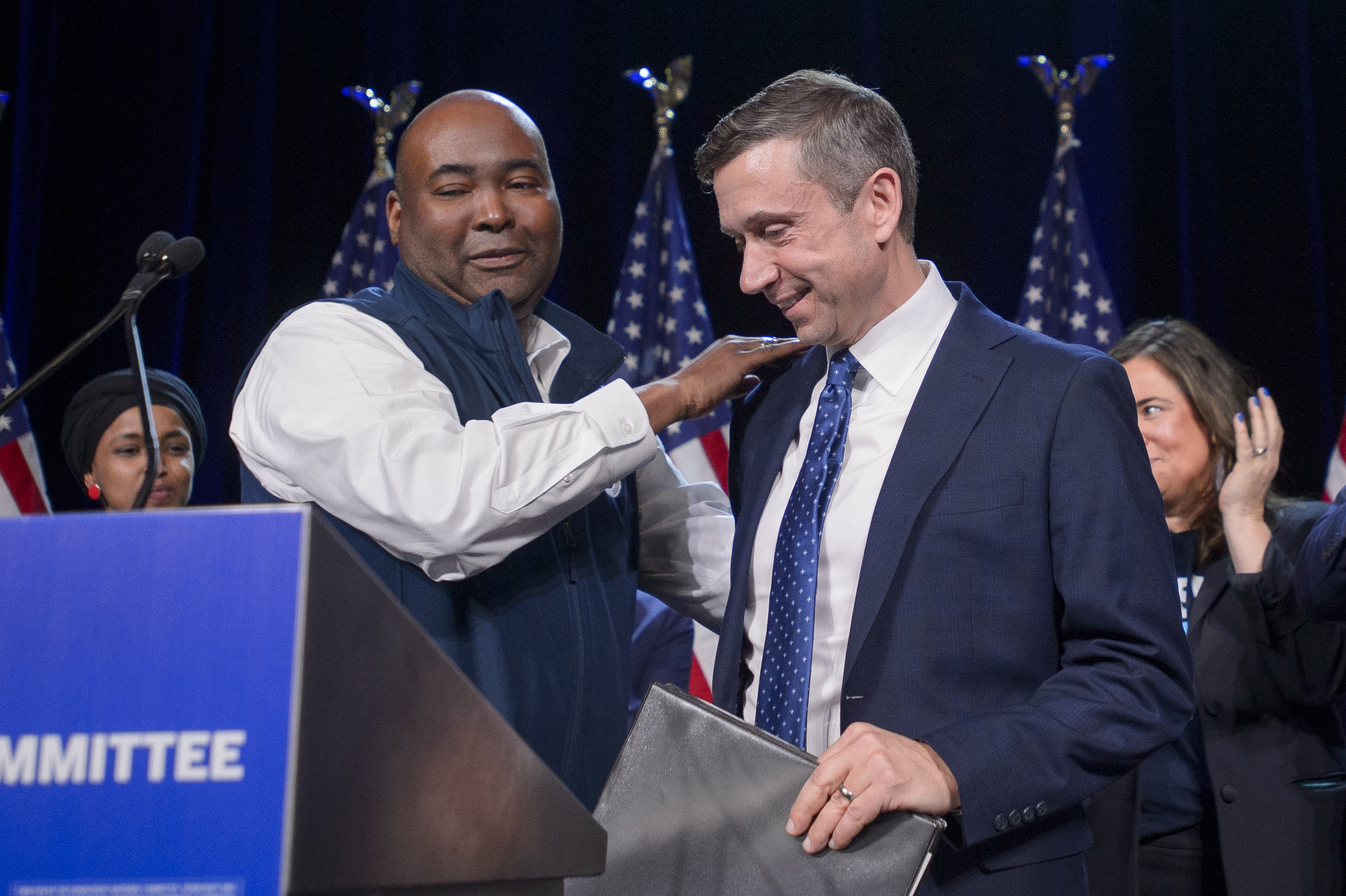 Former Democratic National Committee Chair Jaime Harrison (left) congratulates newly elected DNC Chair Ken Martin (right) at the Gaylord National Resort and Convention Center in National Harbor, Md., Feb. 1, 2025.