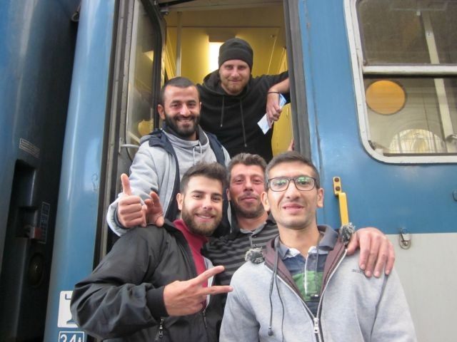 The self-styled "Aleppo Boys" board their train in Budapest, Hungary, for a free ride across Europe circa September, 2015 (Simon Kent/Breitbart News)