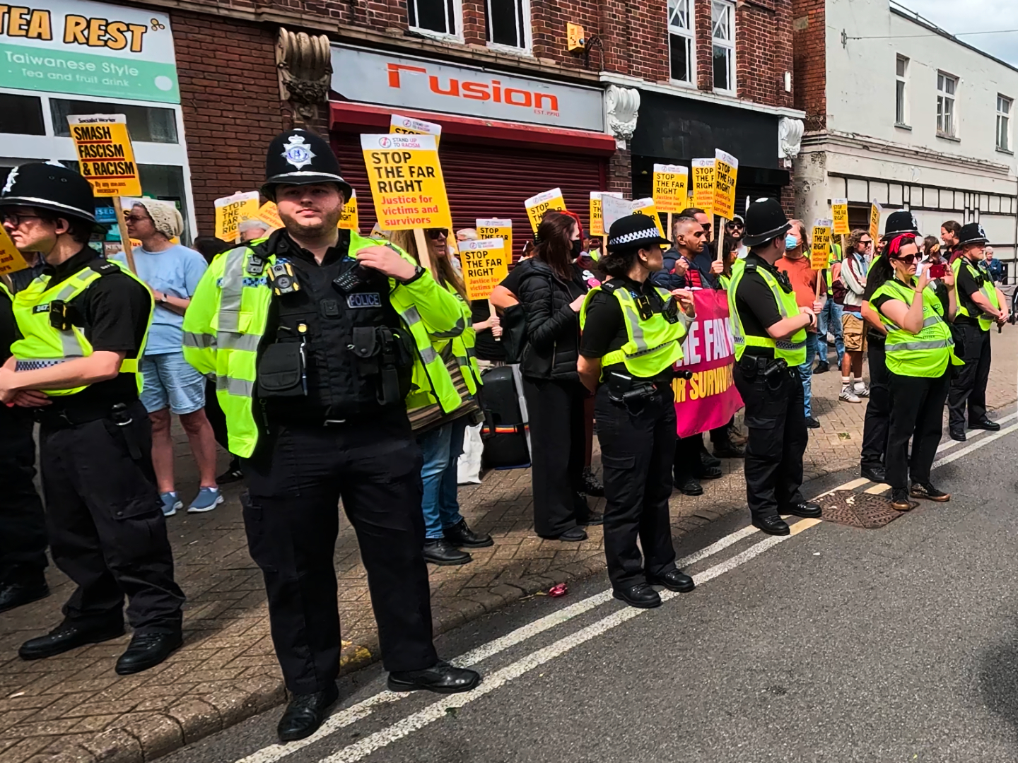 Stand Up to Racism activists gather in opposition to the anti-child rape protest in Nuneaton, England. August 9th, 2025. Oliver Lane, Breitbart News
