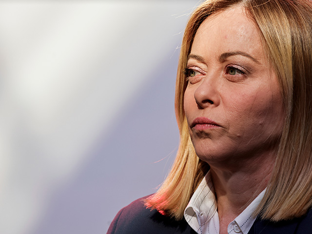Title: France Ukraine Coalition Image ID: 25086393092591 Article: Italian Prime Minister Giorgia Meloni looks on before posing for a family picture as part of the so-called Coalition of the willing summit at the Elysee Palace, Thursday, March 27, 2025 in Paris. (Ludovic Marin, Pool via AP)