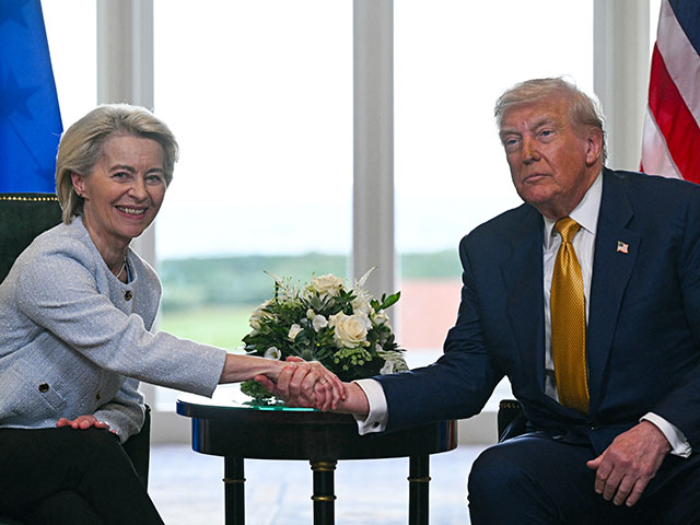 US President Donald Trump (R) shakes hands with European Commission President Ursula von der Leyen (L) after agreeing on a trade deal between the two economies following their meeting, in Turnberry south west Scotland on July 27, 2025, on the third day of his visit to the country, since his second tenure as President began. US President Donald Trump said on July 27, 2025 that he had reached a trade agreement with European Union chief Ursula von der Leyen. "We have reached a deal. It's a good deal for everybody," Trump told reporters after talks with von der Leyen at his golf resort in Turnberry, Scotland. The EU chief also hailed it as a "good deal". (Photo by Brendan SMIALOWSKI / AFP) (Photo by BRENDAN SMIALOWSKI/AFP via Getty Images)