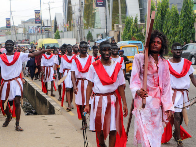 ABUJA, NIGERIA - MARCH 29: A ceremony is being held on the occasion of Good Friday, the day commemorating the crucifixion of Jesus Christ, a day before Easter in Abuja, Nigeria on March 29, 2024. People participating in the event reenacted the crucifixion of Jesus as part of a play titled 'The Passion of the Christ.' (Photo by Emmanuel Osodi/Anadolu via Getty Images)