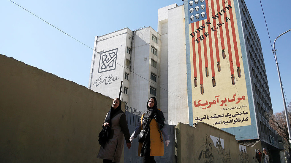 Iran-backed armed group warns of ‘long war’ if US strikes Tehran