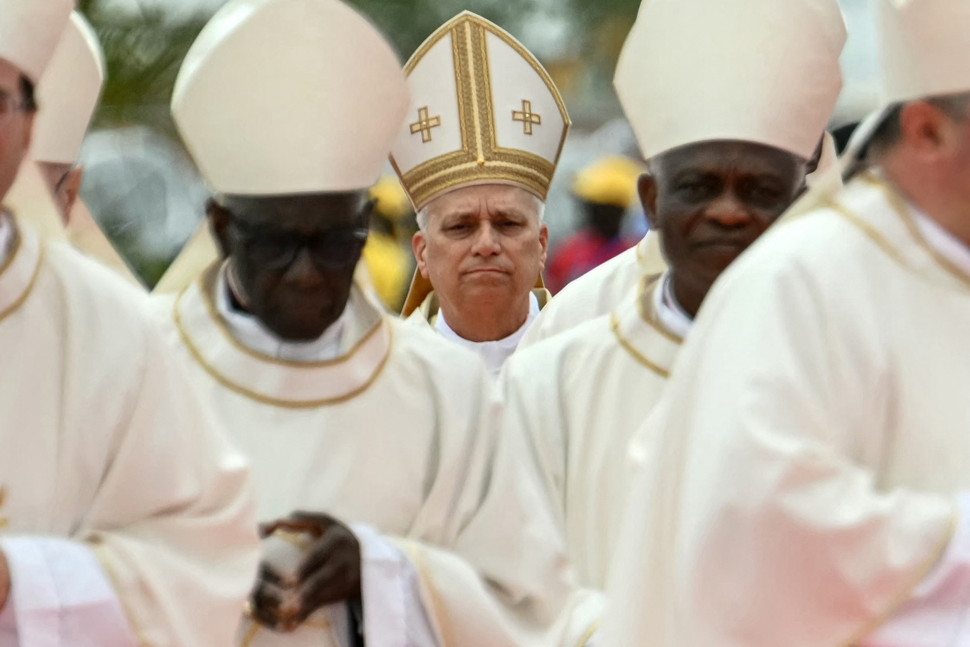 Pope Leo XIV (C) arrives to lead a Holy Mass in Kilamba on the seventh day of an 11-day apostolic journey to Africa, on April 19, 2026. (Photo by Alberto PIZZOLI / AFP via Getty Images)