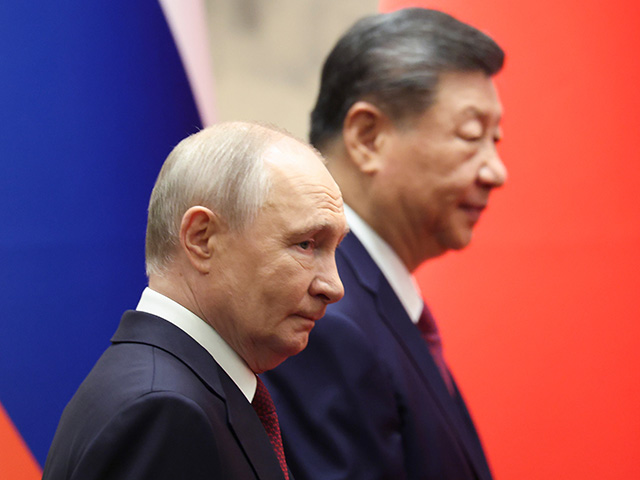 Title: China Russia Putin Image ID: 26140239735783 Article: Russian President Vladimir Putin, left, and Chinese President Xi Jinping attend a signing ceremony at the Great Hall of the People in Beijing Wednesday, May 20, 2026. (Maxim Shemetov/Pool Photo via AP)